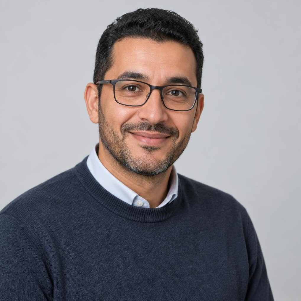 Portrait of a Belgian trainer of Moroccan descent smiling